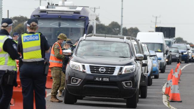 Traffic banked back at a checkpoint on the Princes Freeway heading out of Melbourne towards Geelong at Little River. Picture: Andrew Henshaw