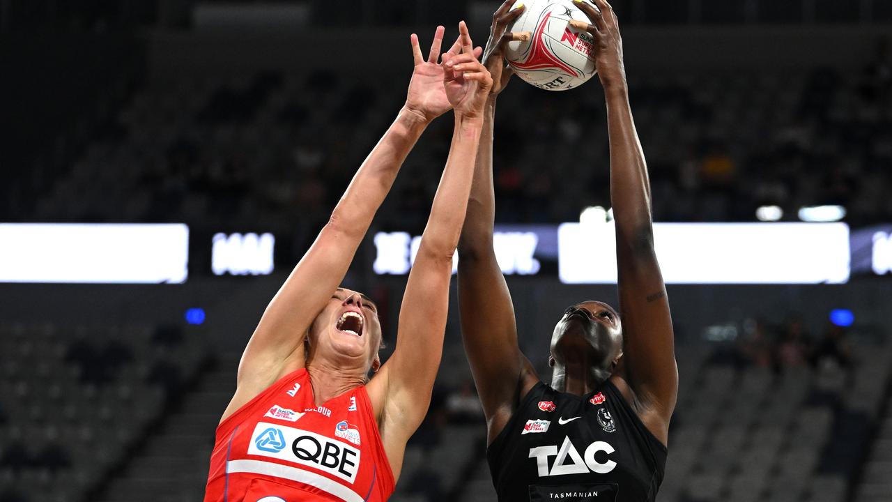 Magpie Shimona Nelson catches the ball as Sarah Klau of the Swifts stretches to defend during round one. Picture: Getty Images