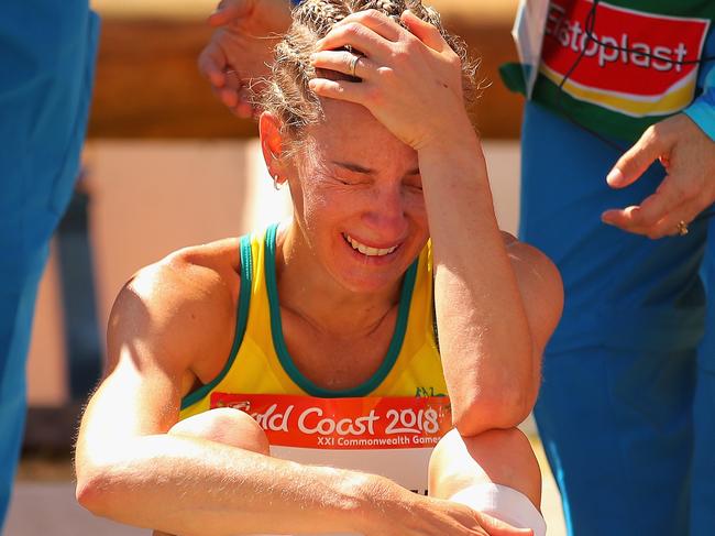 GOLD COAST, AUSTRALIA - APRIL 08:  Claire Tallent of Australia reacts after she is disqualified during the Women's 20km Race Walk Final on day four of the Gold Coast 2018 Commonwealth Games at Currumbin Beachfront on April 8, 2018 on the Gold Coast, Australia.  (Photo by Scott Barbour/Getty Images)