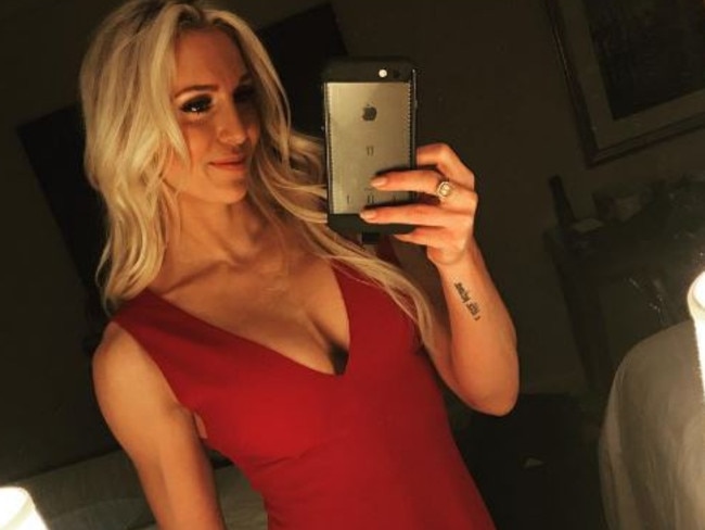 WWE star Charlotte Flair poses for a selfie. 