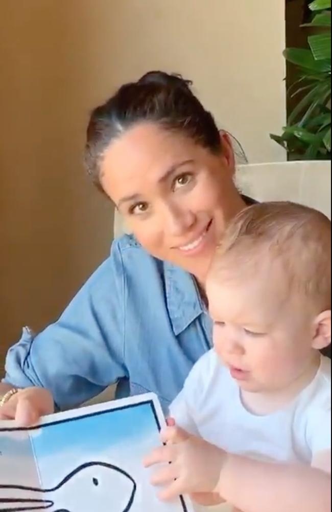 Meghan and Harry gave fans a rare glimpse of their son Archie on his first birthday, sharing a video of mum reading him a story. Picture: Instagram