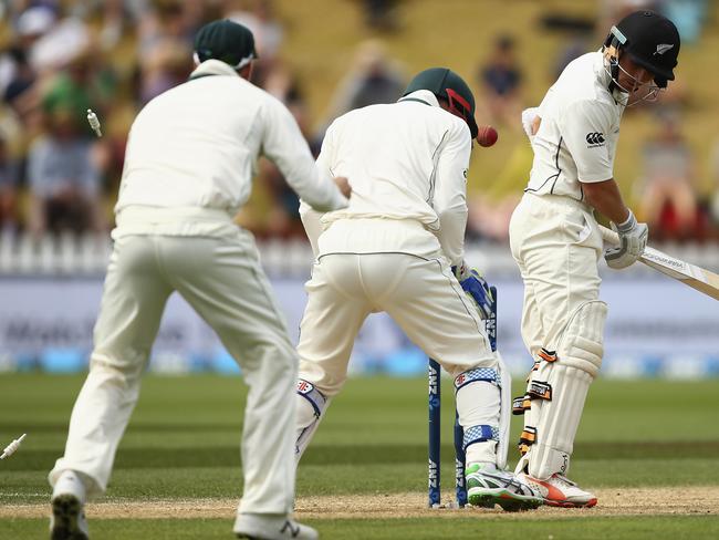 BJ Watling has his stumps disturbed by Nathan Lyon.