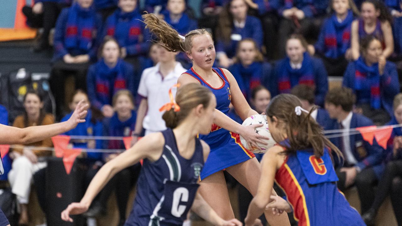 Haly Adam gets possession for Downlands Junior B against St Ursula's Junior B in Merici-Chevalier Cup netball at Salo Centre, Friday, July 19, 2024. Picture: Kevin Farmer