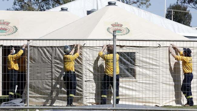 Tent housing and a temporary operations centre are set up on the Wilcannia Oval. Picture: Chris Pavlich