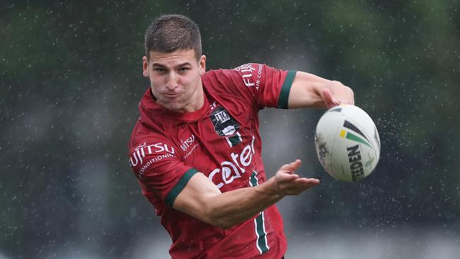 Adam Doueihi in the rain at South Sydney training today. Picture: Brett Costello