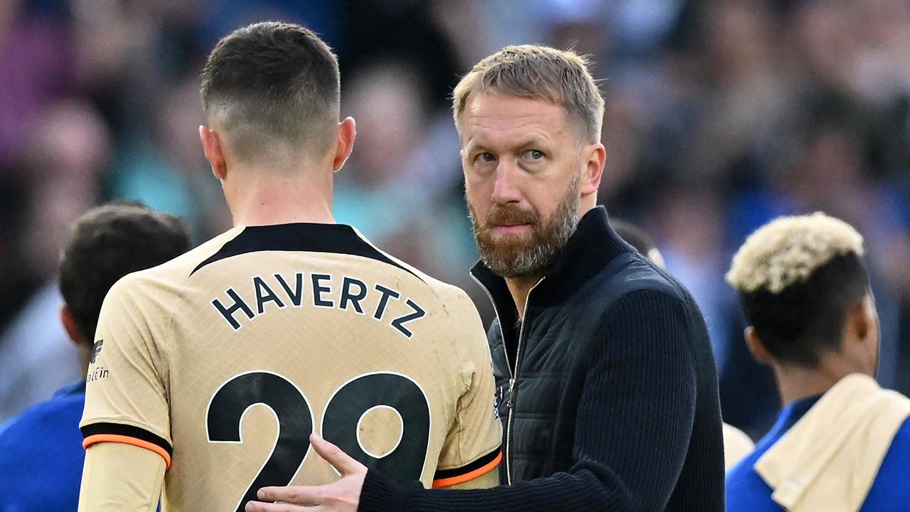 Chelsea's German midfielder Kai Havertz (L) and Chelsea's English head coach Graham Potter (R) on the pitch after the final whistle of the English Premier League football match between Brighton and Hove Albion and Chelsea at the American Express Community Stadium in Brighton, southern England on October 29, 2022. (Photo by Glyn KIRK / AFP) / RESTRICTED TO EDITORIAL USE. No use with unauthorised audio, video, data, fixture lists, club/league logos or 'live' services. Online in-match use limited to 120 images. An additional 40 images may be used in extra time. No video emulation. Social media in-match use limited to 120 images. An additional 40 images may be used in extra time. No use in betting publications, games or single club/league/player publications. /