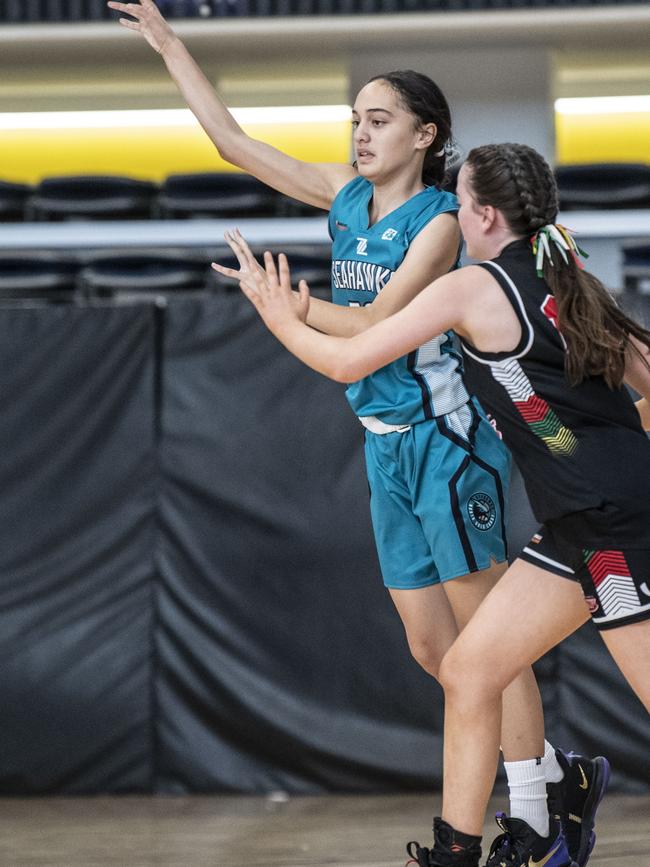 Shayla Henare for Seahawks and Shaliyah Forbes for Titans. Div 2 Gold Medal Match North Gold Coast Seahawks Teal vs Southern Districts Titans. Under 16 Girls State Basketball Championships. Friday, April 15, 2022. Picture: Nev Madsen.