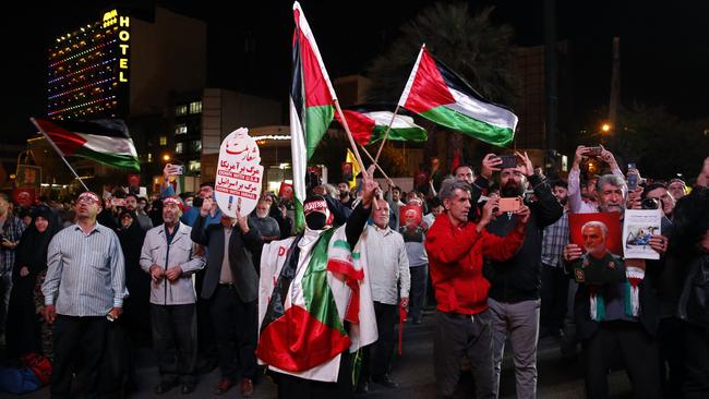 Iranians attend a gathering in Tehran on October 7, 2023, to express their solidarity with Palestine after Hamas militants launched a deadly air, land and sea assault into Israel from the Gaza Strip. Picture: AFP