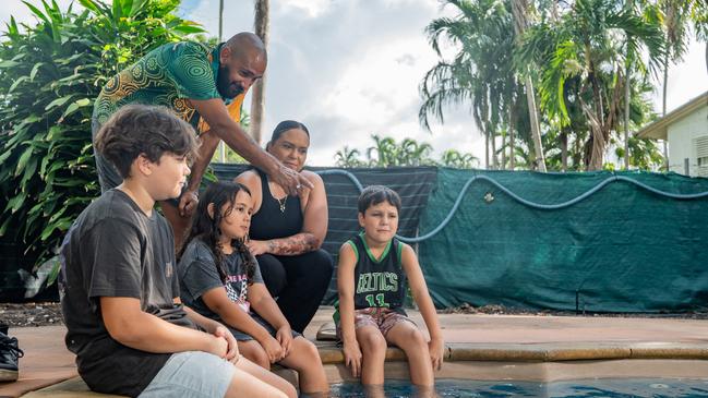 Darwin parents Sarah and Murray Liddle with their children Bradley, 12, Orlando, 9, and six-year-old Brooklyn getting the keys to their new home through the Yilli Rreung Housing Aboriginal Corporation.