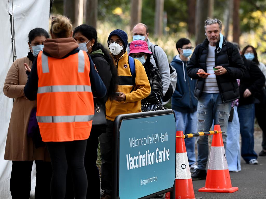 People line up to receive their Covid-19 vaccination at the NSW Health Vaccination hub in Sydney. Picture: NCA NewsWire/Bianca De Marchi