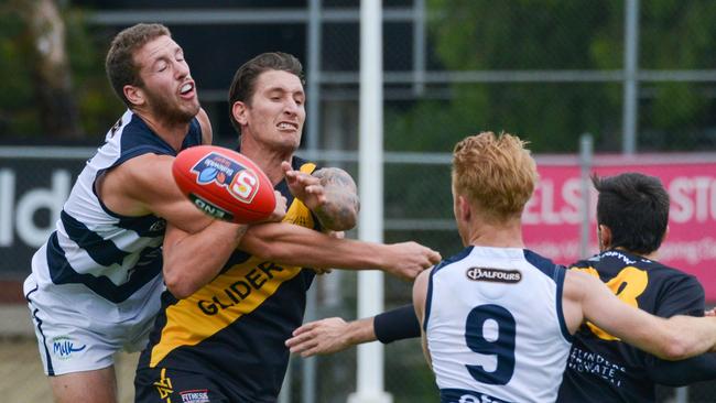 South Adelaide ruckman Michael Knoll spoils Glenelg's Jesse White. Picture: AAP Image/Brenton Edwards