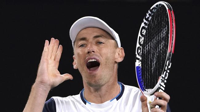 Australia's John Millman reacts during his third round match against Switzerland's Roger Federer at the Australian Open tennis championship in Melbourne. (AP Photo/Lee Jin-man, File)