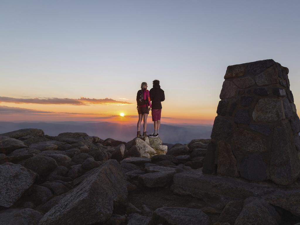 The view from the top. You can watch the sun set at the summit of Mount Kosciuszko in Kosciuszko National Park. Picture: Tourism Snowy Mountains