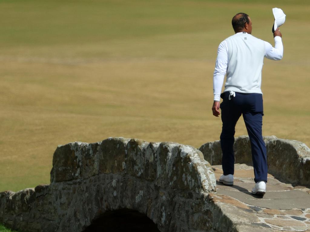 Woods crosses the famous Swilcan Bridge, possibly for the final time at an Open. Picture: Andrew Redington/Getty Images