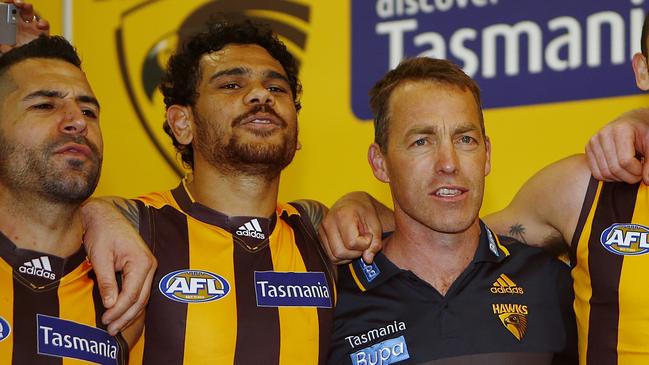 Cyril Rioli and Alastair Clarkson. Picture: Wayne Ludbey