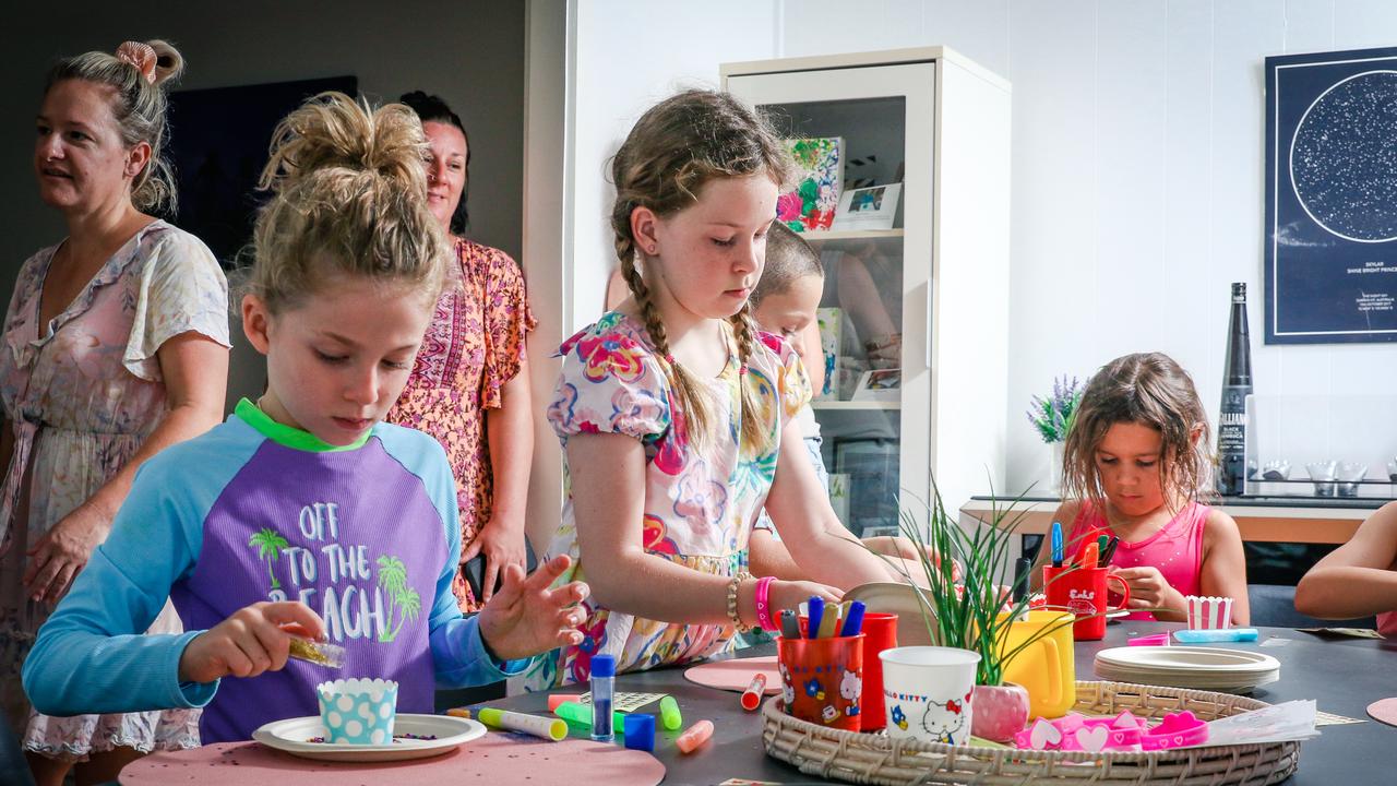 It's been five years since Skylar Lawrence lost her life from meningococcal B. Her brother and sister Navaro and Rhainer team up with friends like Juno Maglieri to make paper lanterns to celebrate the lives of Australian kids who have died from the disease. Picture: Glenn Campbell