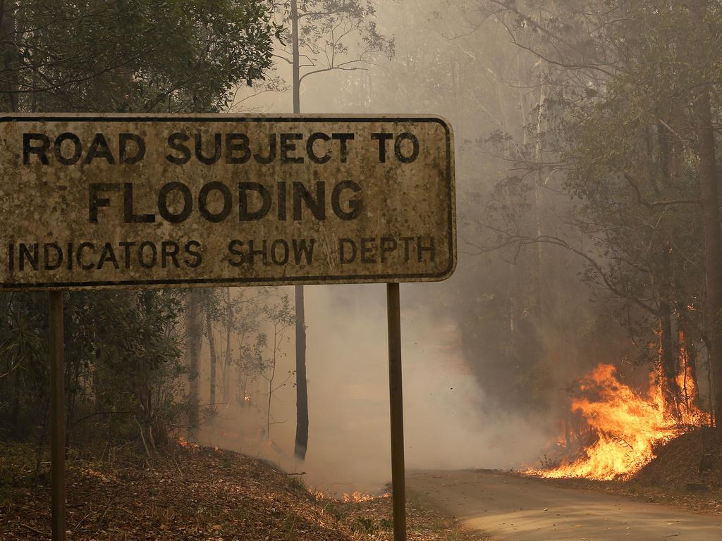 Flames burn at Half Chain road at Koorainghat, part of the Hillville fire near Taree. Picture: Darren Pateman/AAP