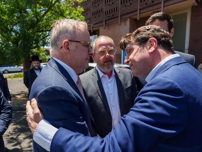 Anthony Albanese talks to members of the local Jewish community during a visit to the Adass Israel Synagogue in Melbourne. Photo: AFP Photo