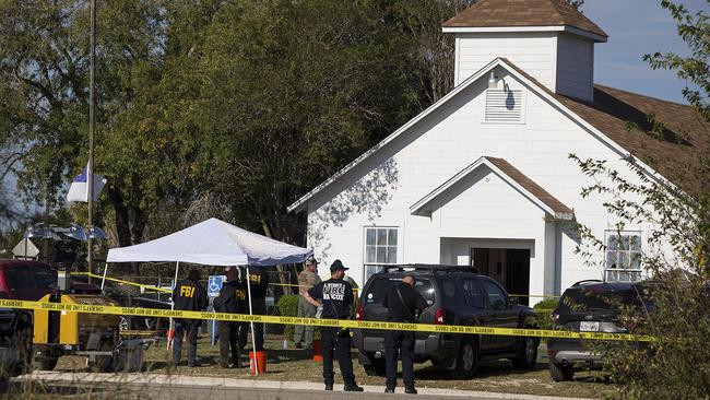 Law enforcement officials at the church. Picture: AP