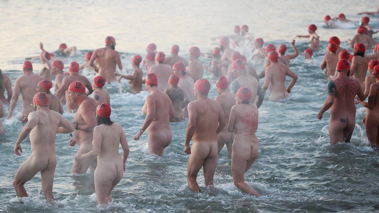 Nude Solstice swim as part of Dark Mofo 2021 at Long Beach Sandy Bay. Picture: Nikki Davis-Jones