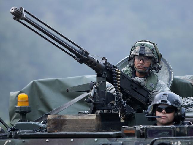 POCHEON, SOUTH KOREA - SEPTEMBER 19:  U.S. soldiers on M113 armored vehicles take part during the Warrior Strike VIII exercise at the Rodriguez Range on September 19, 2017 in Pocheon, South Korea. The United States 2ID (2nd Infantry Division) stationed in South Korea operates the exercise to improve defense capability from any invasion.  (Photo by Chung Sung-Jun/Getty Images)