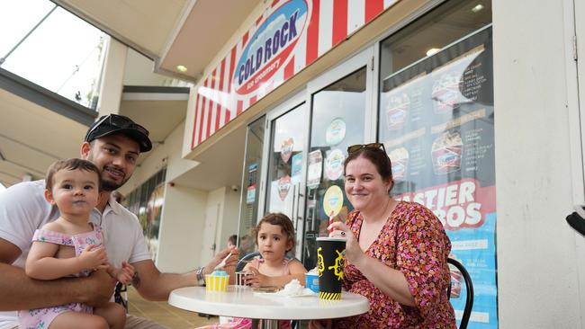 Olivia Rowse, Brandon Rowse, Aubrey Rowse and Karly Hare enjoy some ice-cream to combat the hot weather in Cairns. Picture: Nuno Avendano