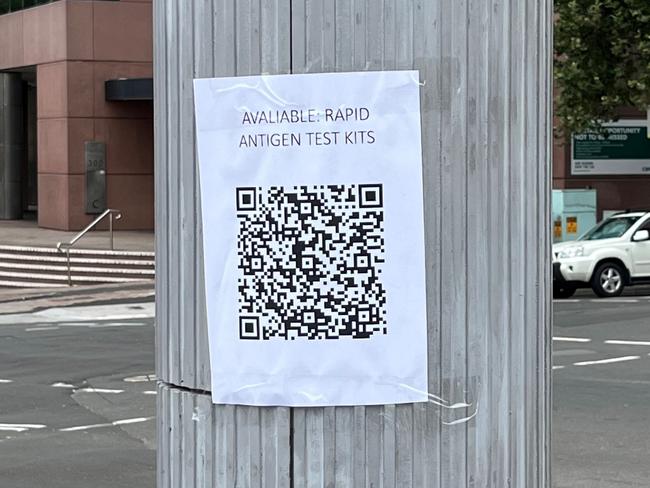 RAT tests for sale for $300 via QR codes on signposts near a Sydney station. Picture: News.com.au.