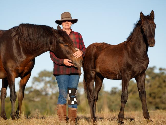 13/4/17 SA Weekend Author Eva Hornung with horses on her farm in the Bugle Ranges. Picture by Matt Turner.