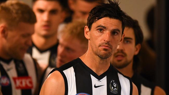 GOLD COAST, AUSTRALIA - JULY 02: Scott Pendlebury of the Magpies leads the team to the field before the round 16 AFL match between the Gold Coast Suns and the Collingwood Magpies at Metricon Stadium on July 02, 2022 in Gold Coast, Australia. (Photo by Albert Perez/Getty Images)