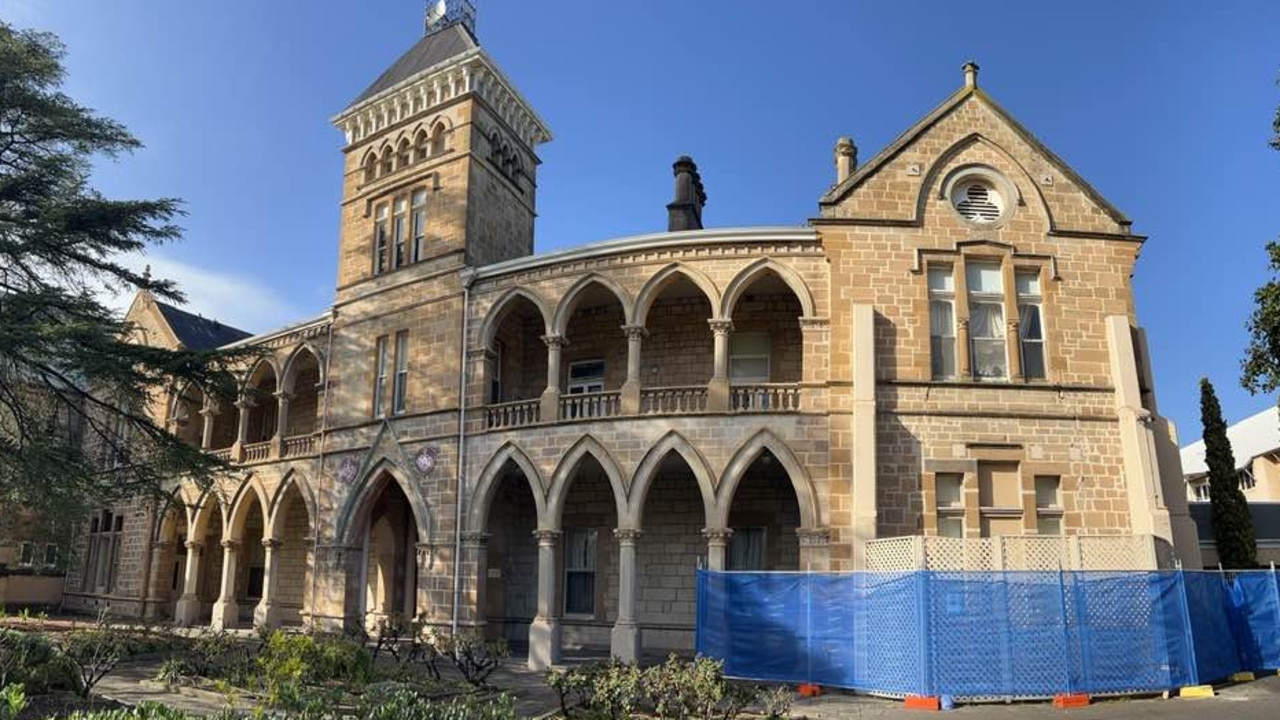 Cordoned off by a blue barrier, this part of Annesley College’s historic main building has deemed beyond repair and will be demolished. Picture: Annesley Junior School