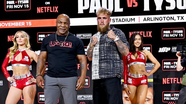 Mike Tyson and Jake Paul face off at a press conference ahead of their November bout. (Photo by Roy Rochlin/Getty Images for Fanatics)