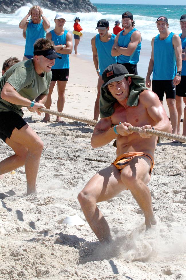 Rhys King (right) in a tug-of-war battled during the Southport Sharks VFL team during a preseason training camp at Tallebudgera Bbeach. Picture: Mike Batterham