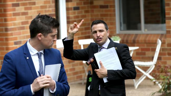 Auctioneer Vic Lorusso at the auction of 16 Grace Ave, Frenchs Forest. Picture: AAP