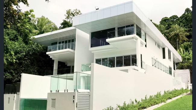 Offers of more than $6m and $6.5m apiece are sought for each of two ultra-luxurious beach houses at 1-3 Peacock St, Trinity Beach. The properties built and owned by Cairns-based developer Alex Sekler span three levels and have five bedrooms, each with ensuites, and internal lifts. Picture: Supplied