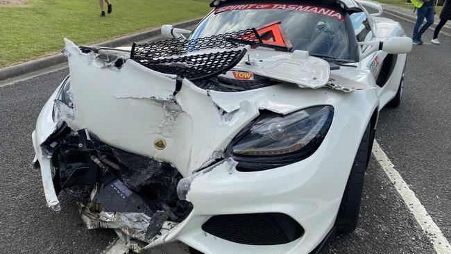 The mangled remains of the Lotus Exige Sport 350 which Peter Taylor and navigator Tristan Taylor walked away from after crashing into a power pole that stopped the George Town stage for 49 minutes. Picture: James Bresnehan