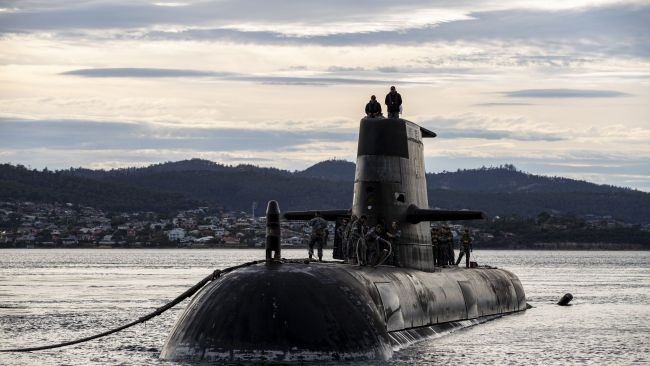 Pictured: Royal Australian Navy submarine HMAS Sheean. Australia reneged on a $90billion deal to acquire diesel submarines from France last year (Photo by LSIS Leo Baumgartner/Australian Defence Force via Getty Images)