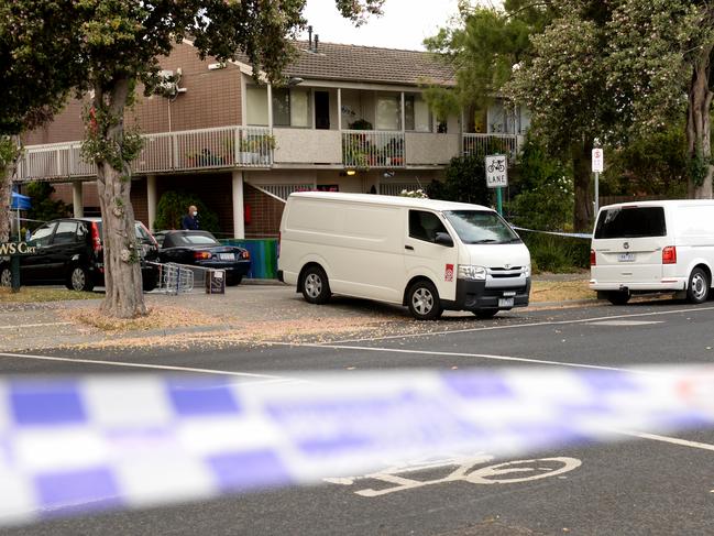 Police investigate the double murder last night at a property at McDonald Street Mordialloc. Picture: Andrew Henshaw