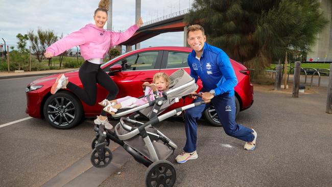 Shaun and Heidi Higgins and daughter Rosie, 22 months. Picture: Alex Coppel