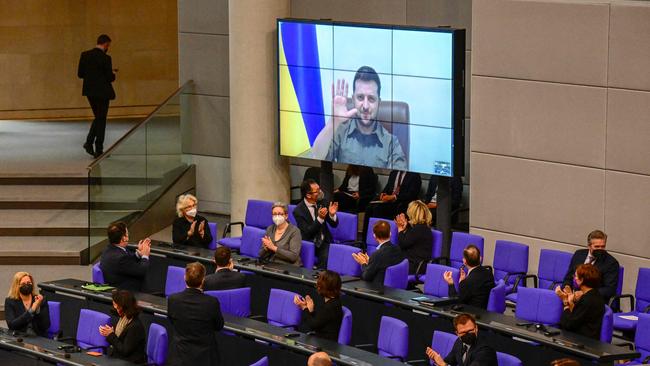 Volodymyr Zelensky receives a standing ovation from members of the Bundestag on Thursday. Picture: AFP