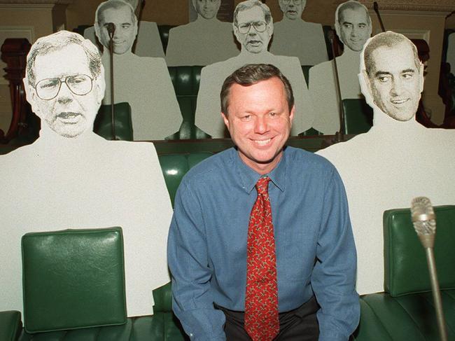 SA politician Mike Rann sitting among foam cut outs of Liberal MPs in Parliament House to emphasise the massive task the Labor Party is facing to win government during election campaign. cutout dummies  /Elections/SA