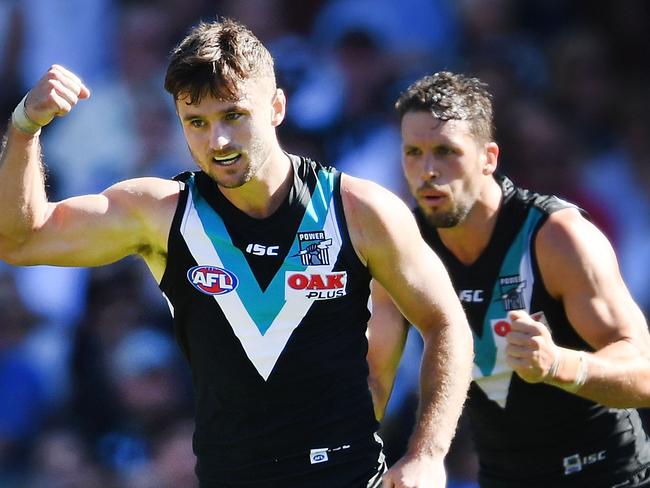 ADELAIDE, AUSTRALIA - APRIL 07:  Sam Gray of Port Adelaide celebrates a goal during the round three AFL match between the Port Adelaide Power and the Brisbane Lions at Adelaide Oval on April 7, 2018 in Adelaide, Australia.  (Photo by Mark Brake/Getty Images)