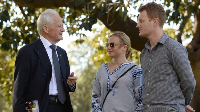 Former federal minister Philip Ruddock talks with Jody and Gavin Bannerman ahead of the council elections. Picture: Jeremy Piper