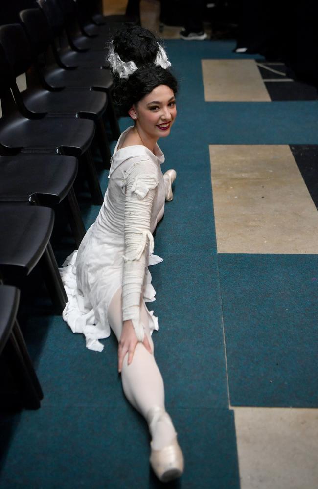Townsville Eisteddfod 2023. Age 16 to 18 Demi-Character Solo. Kalista Nelson stretches in the wings before her performance. Picture: Evan Morgan.