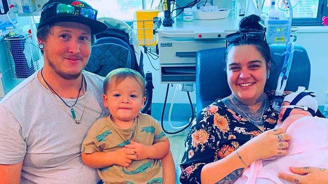 Little Luna with parents Cameron Staib and La Toya Redman and big brother Forest during her lifesaving visit to hospital. Pictures: Contributed