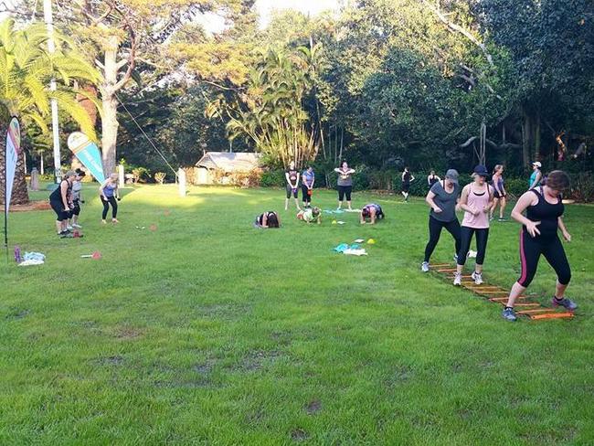 Live Life, Get Active participants work out at the Botanic Gardens.