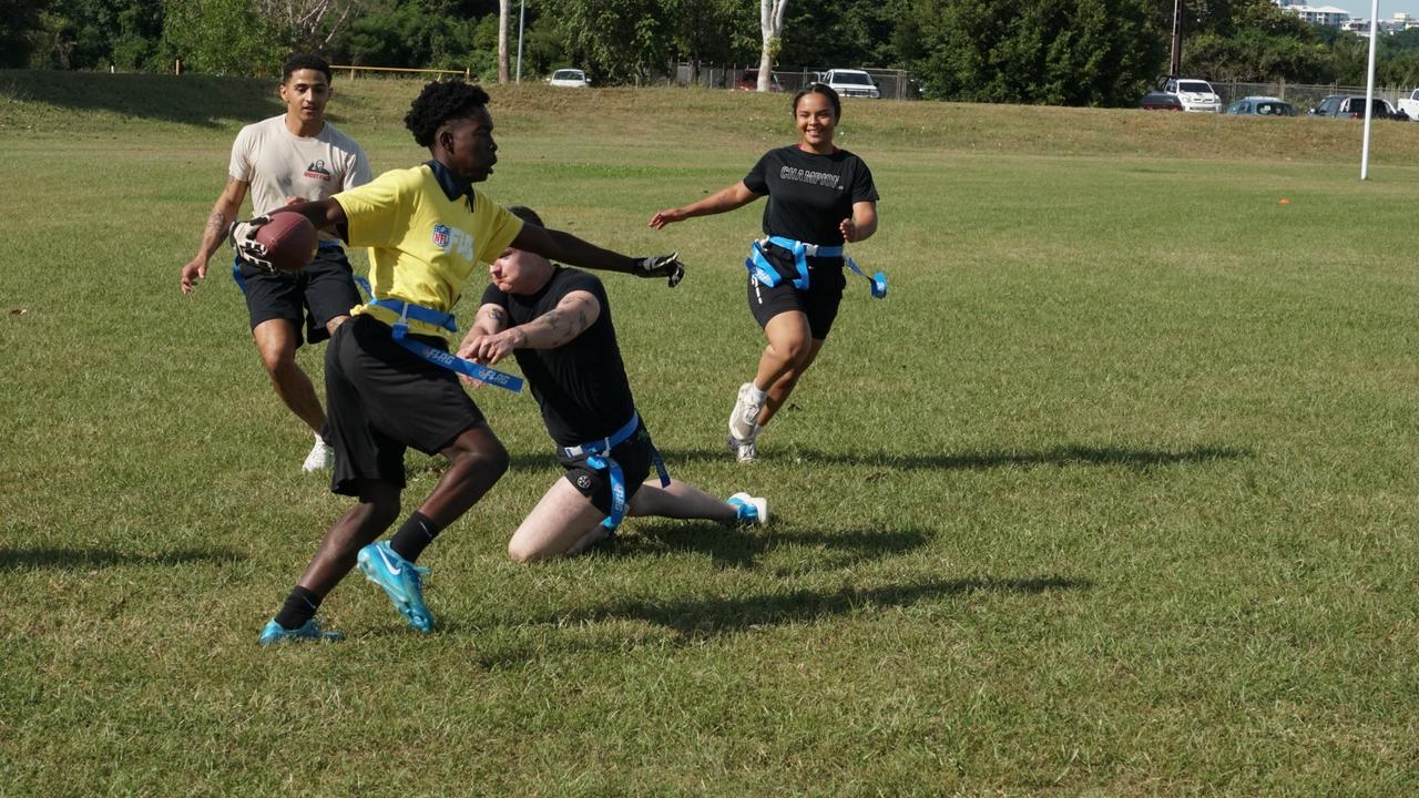 Darwin Middle School students playing Flag Football against United States Marines at DMS, 19 May 2025. Picture: Jason McIntosh