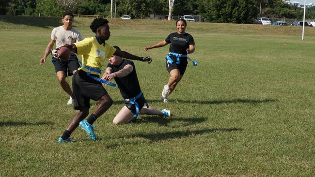 Darwin Middle School students playing Flag Football against United States Marines at DMS, 19 May 2025. Picture: Jason McIntosh