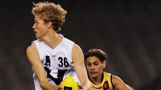 Sam De Koning takes possession for Vic Country at the under-18 carnival.