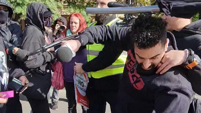 Controversial media figure Avi Yemini was ‘bonked’ on the head with a metal pole during the riot. Picture: Kenji Wardenclyffe