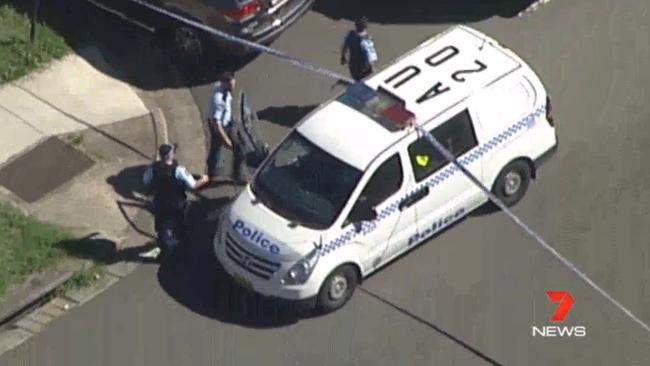 Police and paramedics remain at the scene of the fatal crash. Picture: Seven News